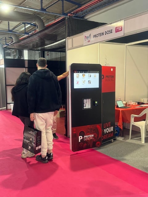 Protein Dose presenting its automated protein beverage solution at an industry exhibition